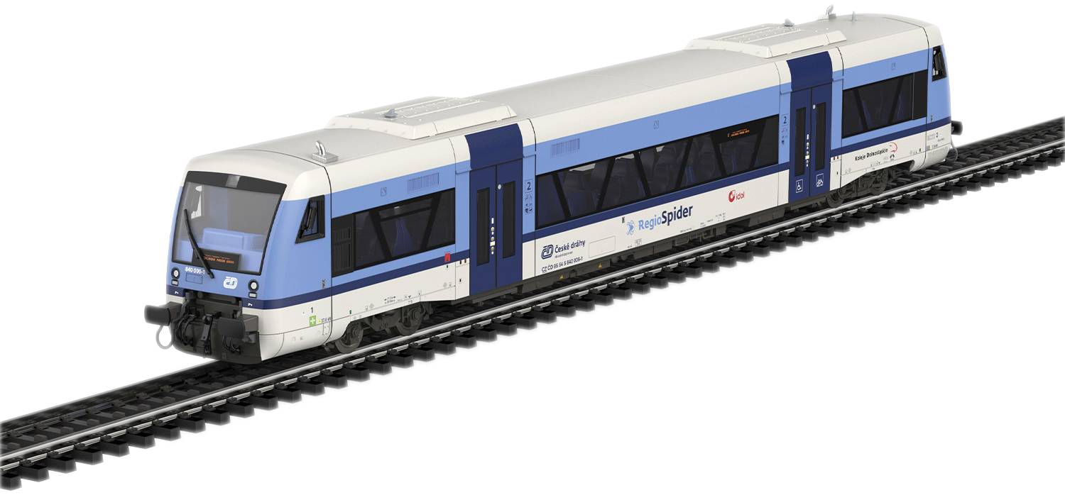 Ein moderner, blauer und weißer Zug fährt auf Gleisen nach rechts. Der Zug ist mit 'Siemens' und den Logos von 'DB' und 'f.l.e.x.' beschriftet.