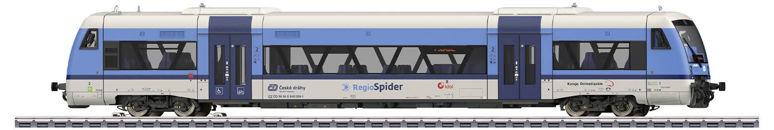 Ein blauer und weißer Zug mit der Aufschrift 'iLINT' fährt auf einem Gleis. Der Zug hat Fenster und Türen entlang der gesamten Seite.