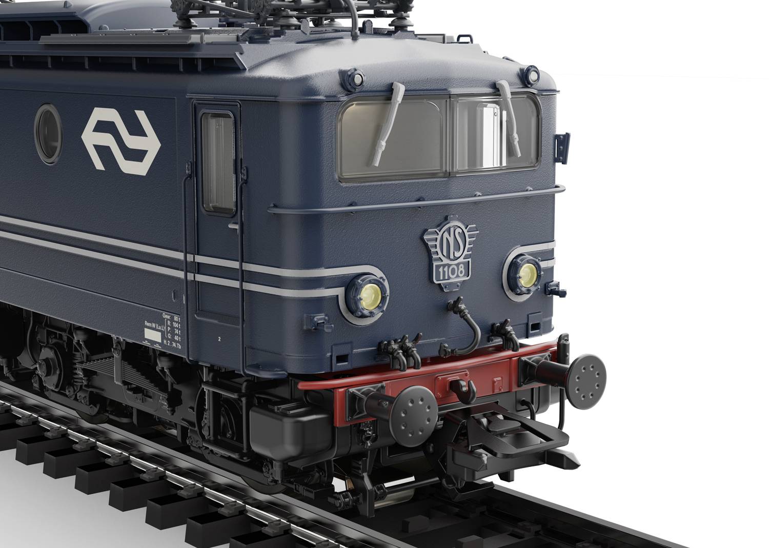 Dunkelblaue Lokomotive der Niederländischen Eisenbahnen auf einem Gleis. Markantes Logo und rot-schwarze Frontdetails erkennbar.