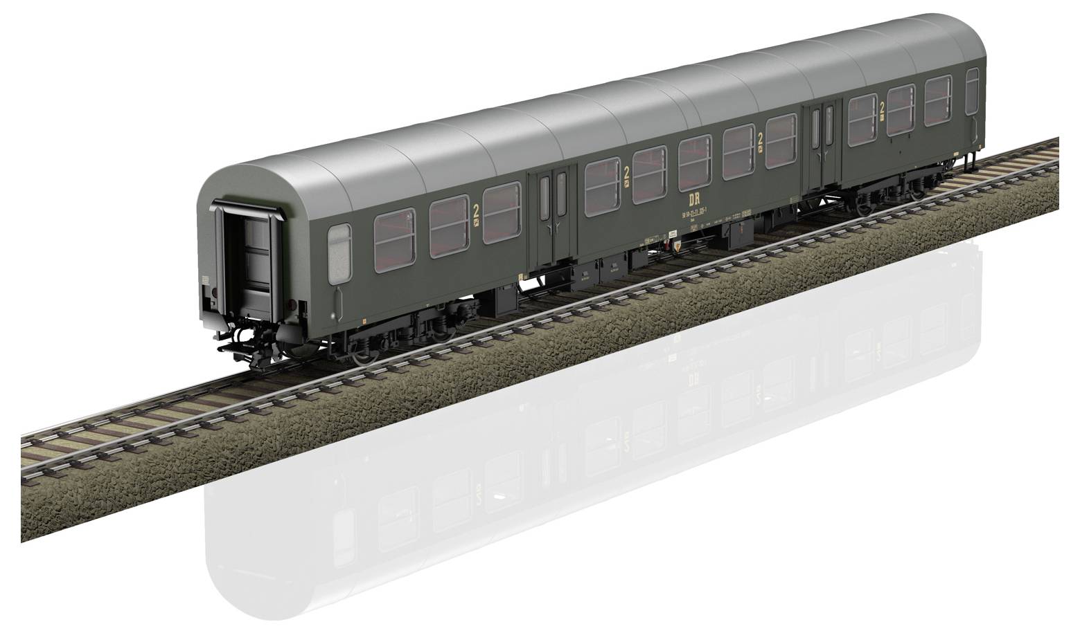 Ein einzelner, grüner Eisenbahnwaggon auf einem Gleis, ohne Lokomotive oder andere Waggons zu sehen.