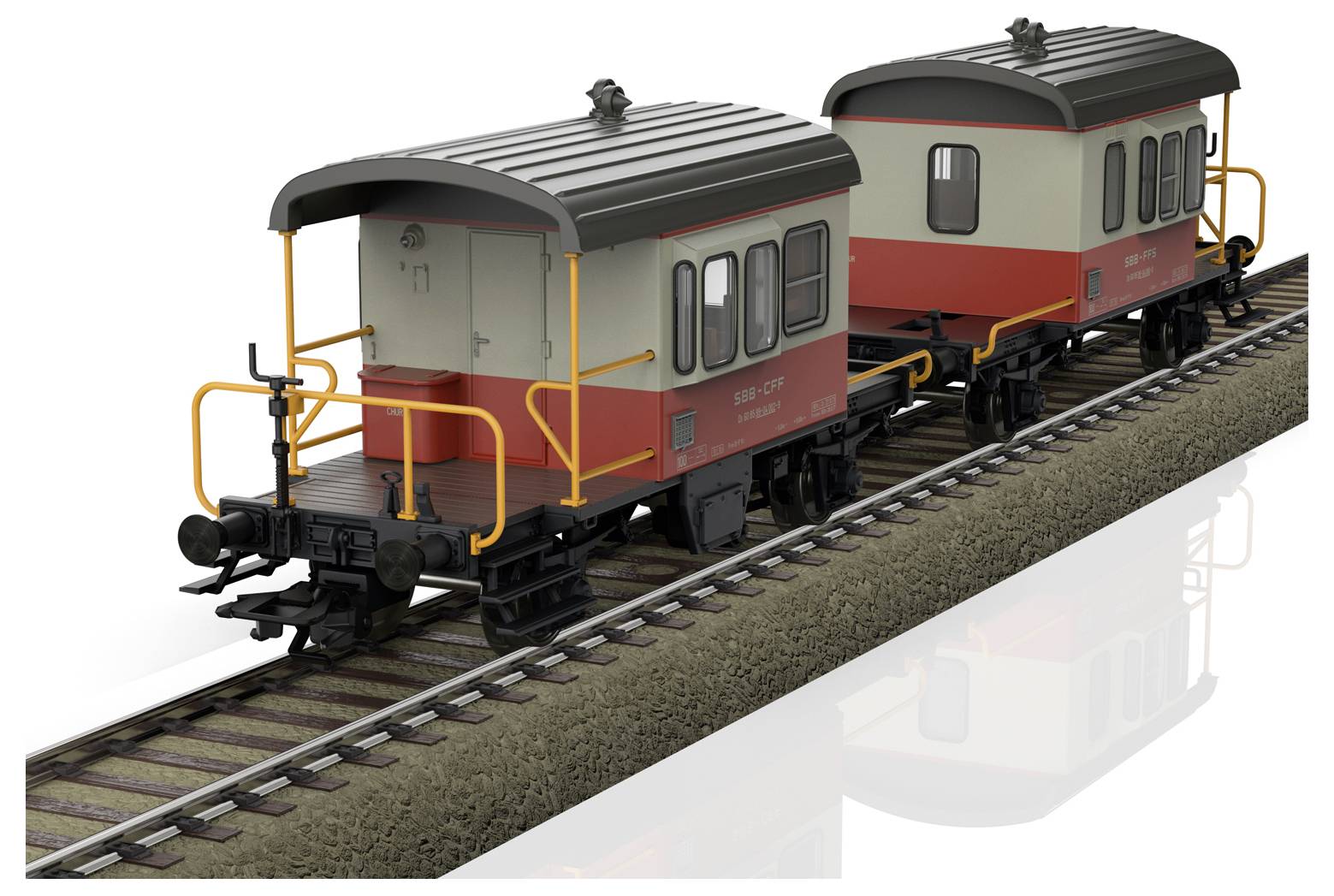 Zwei rot-graue Waggons stehen auf einem Gleis. Beide haben seitliche Fenster und schwarze Dächer. Die Umgebung ist nicht erkennbar.