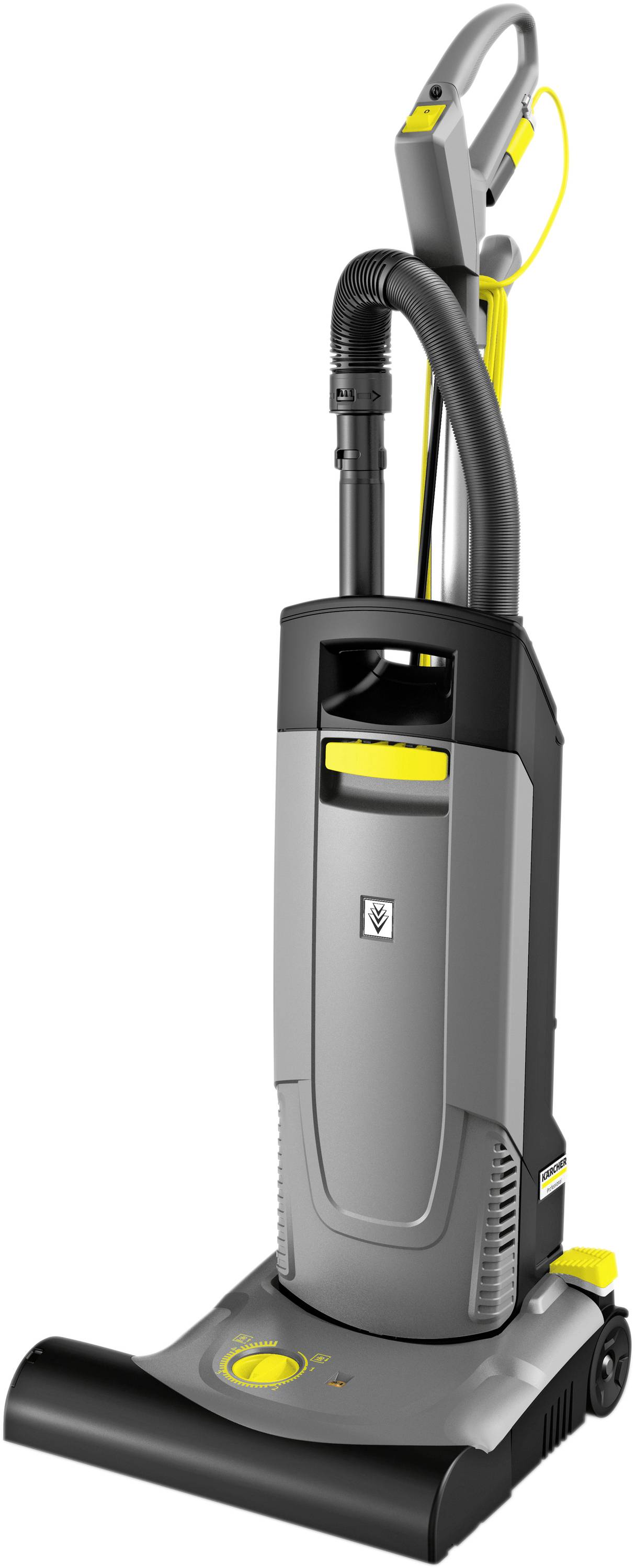 Ein grauer Industrie-Staubsauger mit schwarzem und gelbem Detail, aufrecht stehend, geeignet für die Reinigung von großen Flächen.