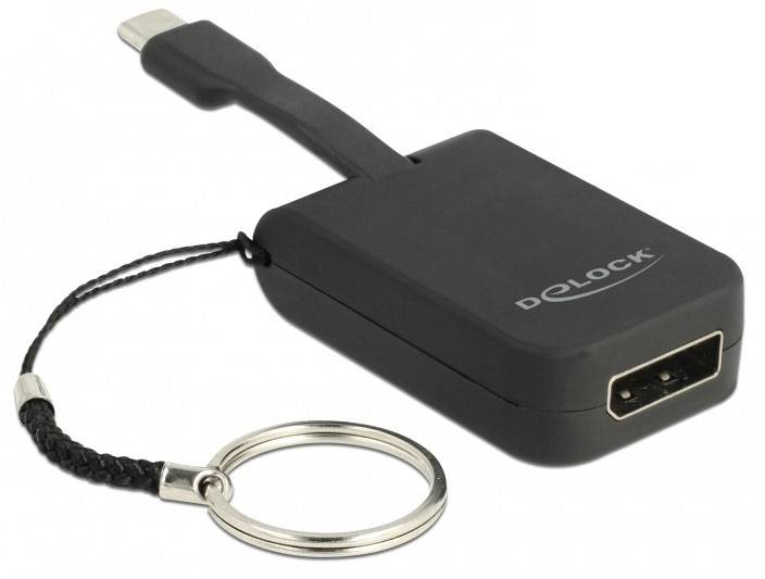 Schwarzer Delock-Adapter mit USB-Anschluss und Schlüsselanhänger.