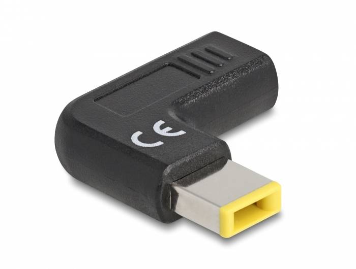 Ein USB-Adapter mit einer gelben und schwarzen Form, markiert mit dem 'CE'-Zeichen, das seine Konformität mit europäischen Normen anzeigt.