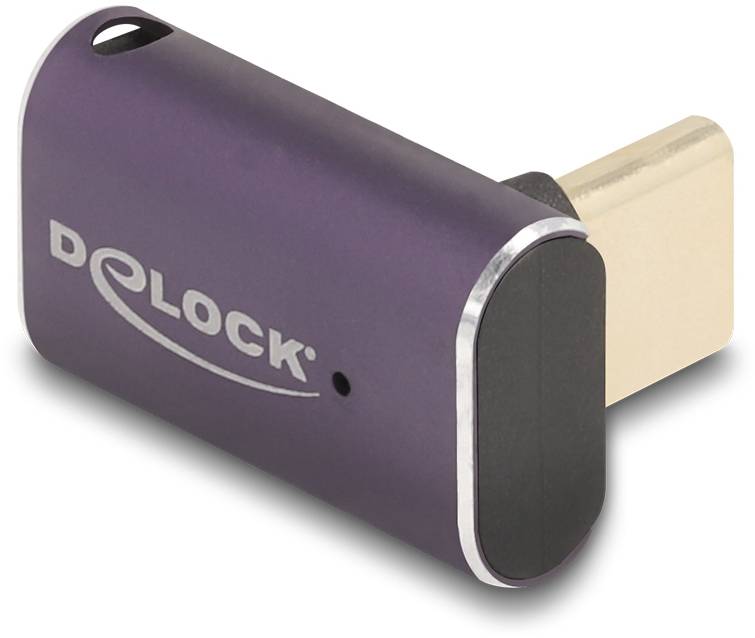 Ein lila USB-C-Adapter von Delock mit ovaler Form und Beschriftung auf der Seite, dargestellt in Schrägansicht.