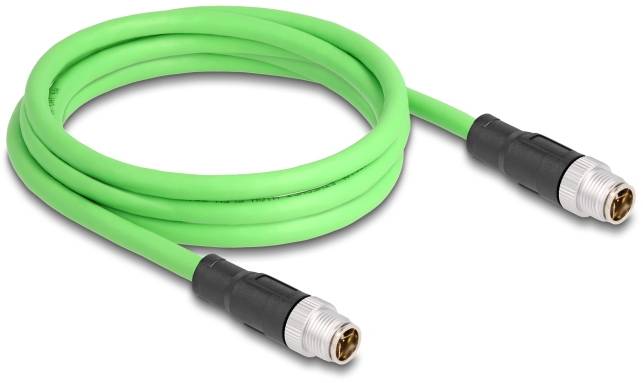 Ein grünes Verbindungskabel mit schwarzen Steckern an beiden Enden, aufgerollt. Geeignet für elektrische oder technische Anwendungen.