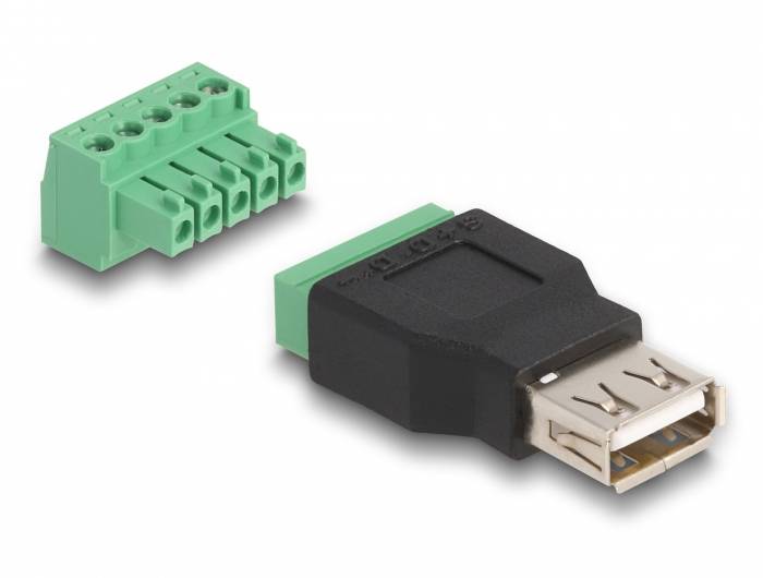 Ein grüner Steckverbinder neben einem USB-Adapter. Der Adapter hat einen schwarzen Körper und eine USB-Buchse.
