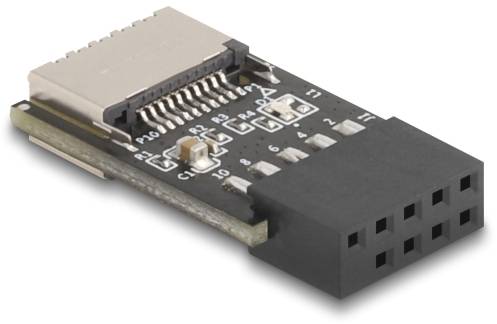 Ein schwarzer Kabeladapter mit mehreren Anschlüssen und einem elektronischen Chip. Enthält zahlreiche Kontaktpunkte und Steckplätze.