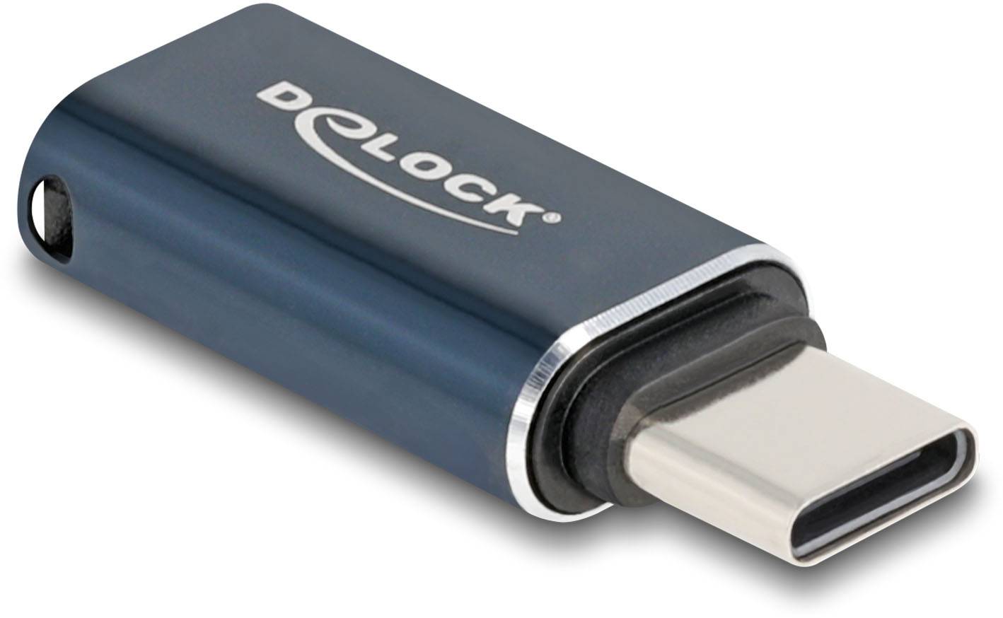 USB-C Adapter von Delock, schwarz mit silbernem Rand, für Verbindungszwecke in technologischem Kontext.