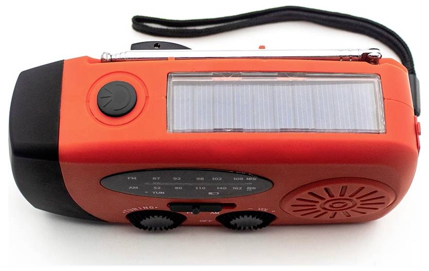 Ein rotes, tragbares, solarbetriebenes Radio mit Kurbelgriff und Lautsprecher, für Notfälle und Outdoor-Aktivitäten.