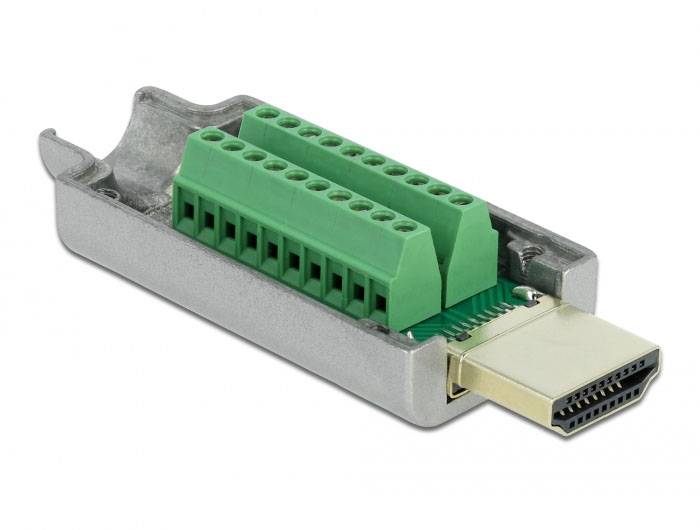 Ein Adapter mit grünen Anschlussklemmen, der auf eine HDMI-Schnittstelle passt, wird in einer Nahaufnahme dargestellt.