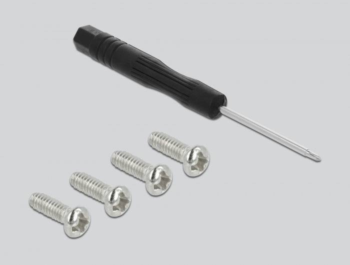 Schwarzer Schraubendreher und vier silberne Schrauben auf grauem Hintergrund.