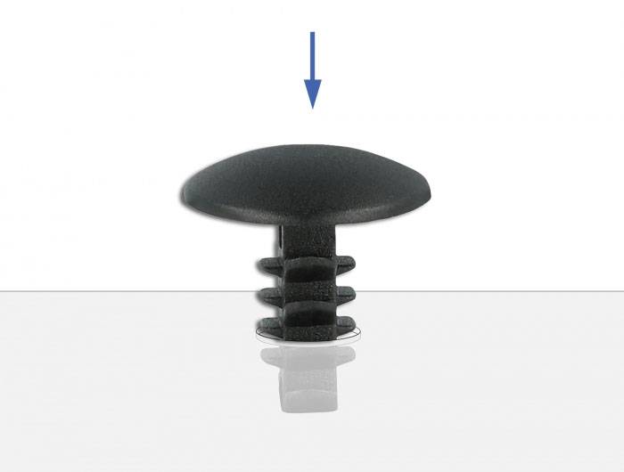 Schwarzer Kunststoffdübel mit Pfeil nach unten, der die Richtung der Platzierung in eine Öffnung anzeigt.