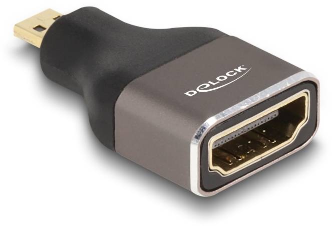 Ein schwarzer HDMI-Adapter von Delock mit einem HDMI-Anschluss auf der einen Seite und einem Micro-USB-Anschluss auf der anderen.