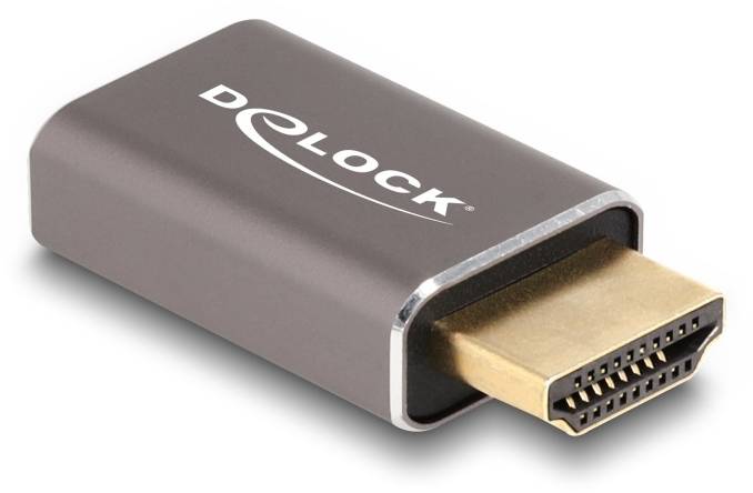 Kleiner HDMI-Adapter in dunklem Gehäuse mit goldfarbenem Anschluss und Aufschrift 'DeLOCK' auf der Oberfläche.