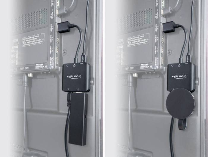 Zwei Netzteile, die in einem grauen Kasten mit elektronischen Geräten angeschlossen sind, links ein länglicher, rechts ein runder Adapter.