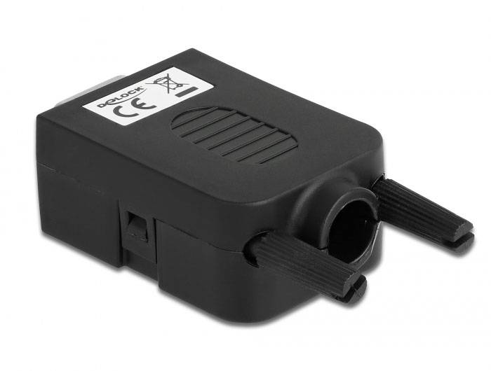 Ein schwarzer Adapter mit zwei Kabelanschlüssen und CE-Kennzeichnung liegt flach auf einer Oberfläche.