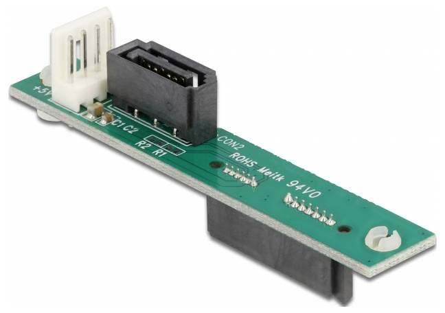 Ein grünes Elektronik-Platinenmodul mit Steckverbindern und der Aufschrift 'RoHS', einem Zeichen für umweltfreundliche Standards.