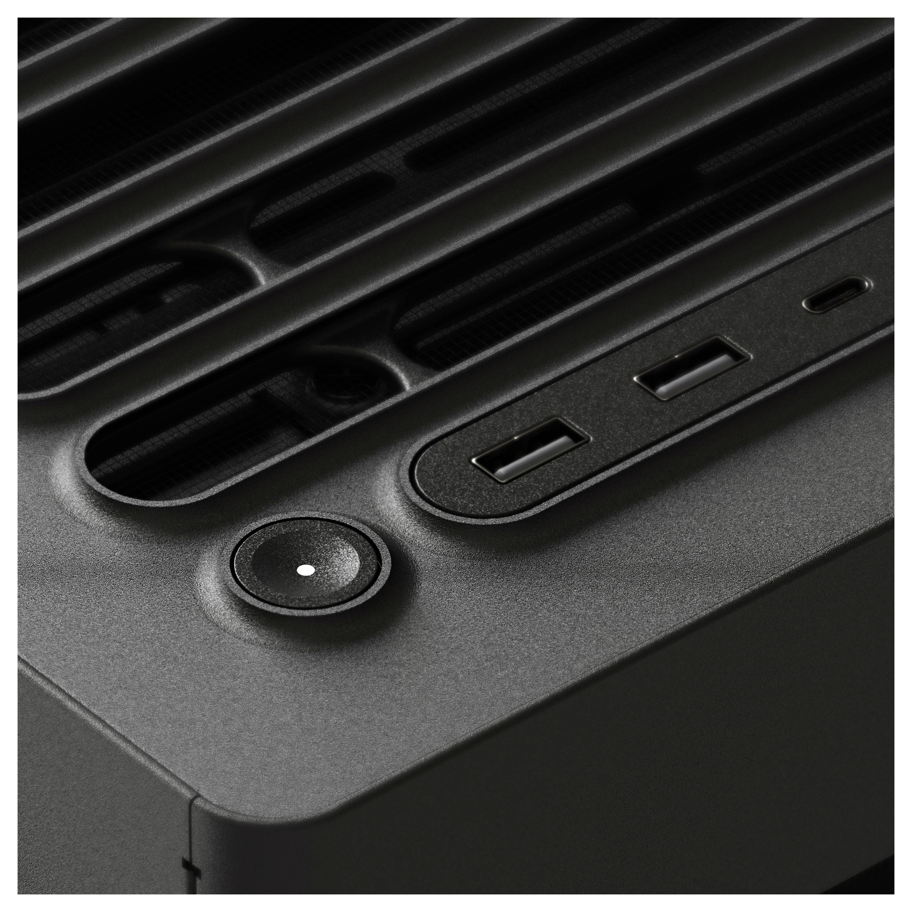 Nahansicht eines Computergehäuses mit einem Tasterknopf und mehreren USB-Anschlüssen an der Oberseite.