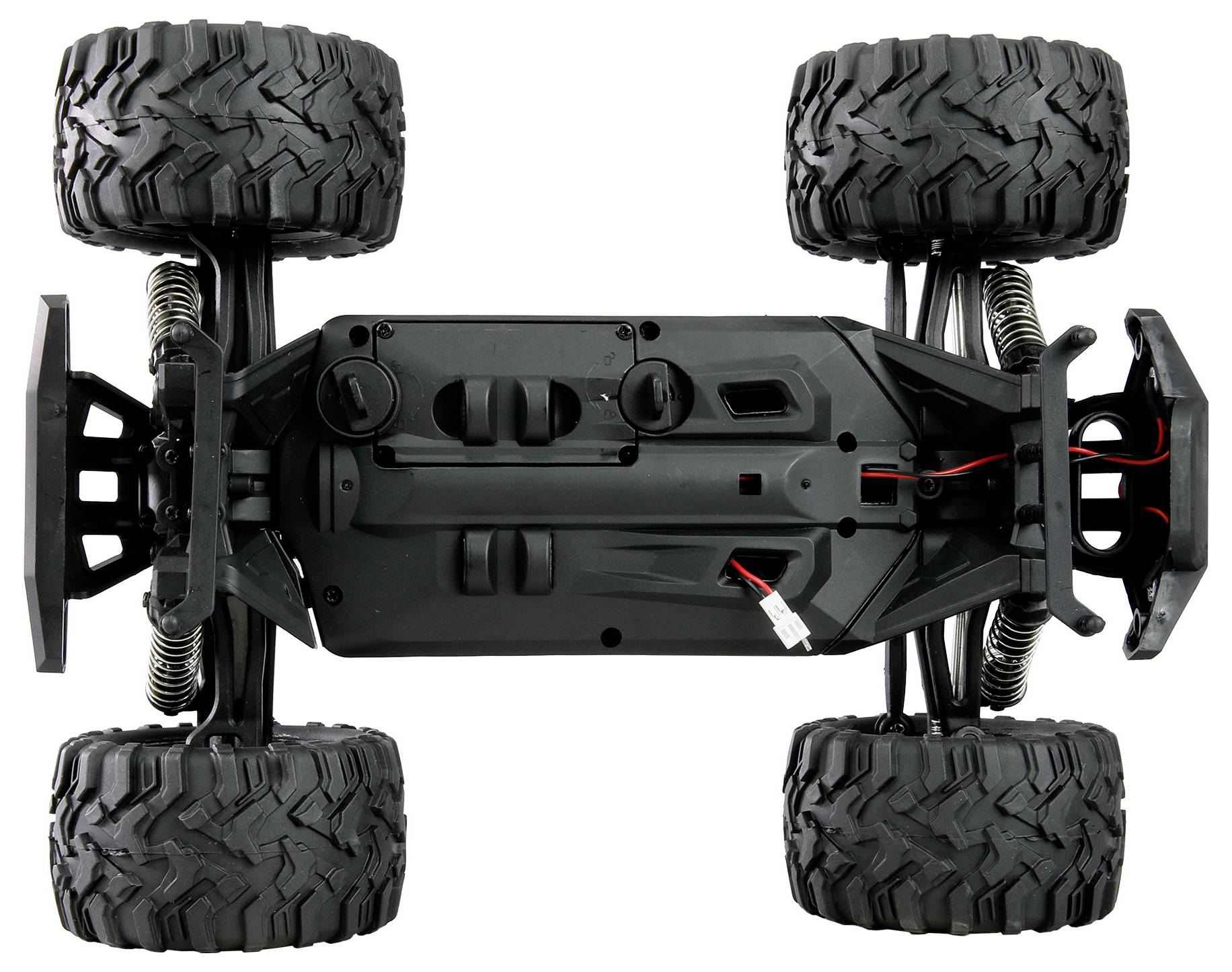 Ferngesteuertes Auto von unten gezeigt, mit großen, robusten Rädern und sichtbaren Federn. Ideal für Offroad-Gelände.