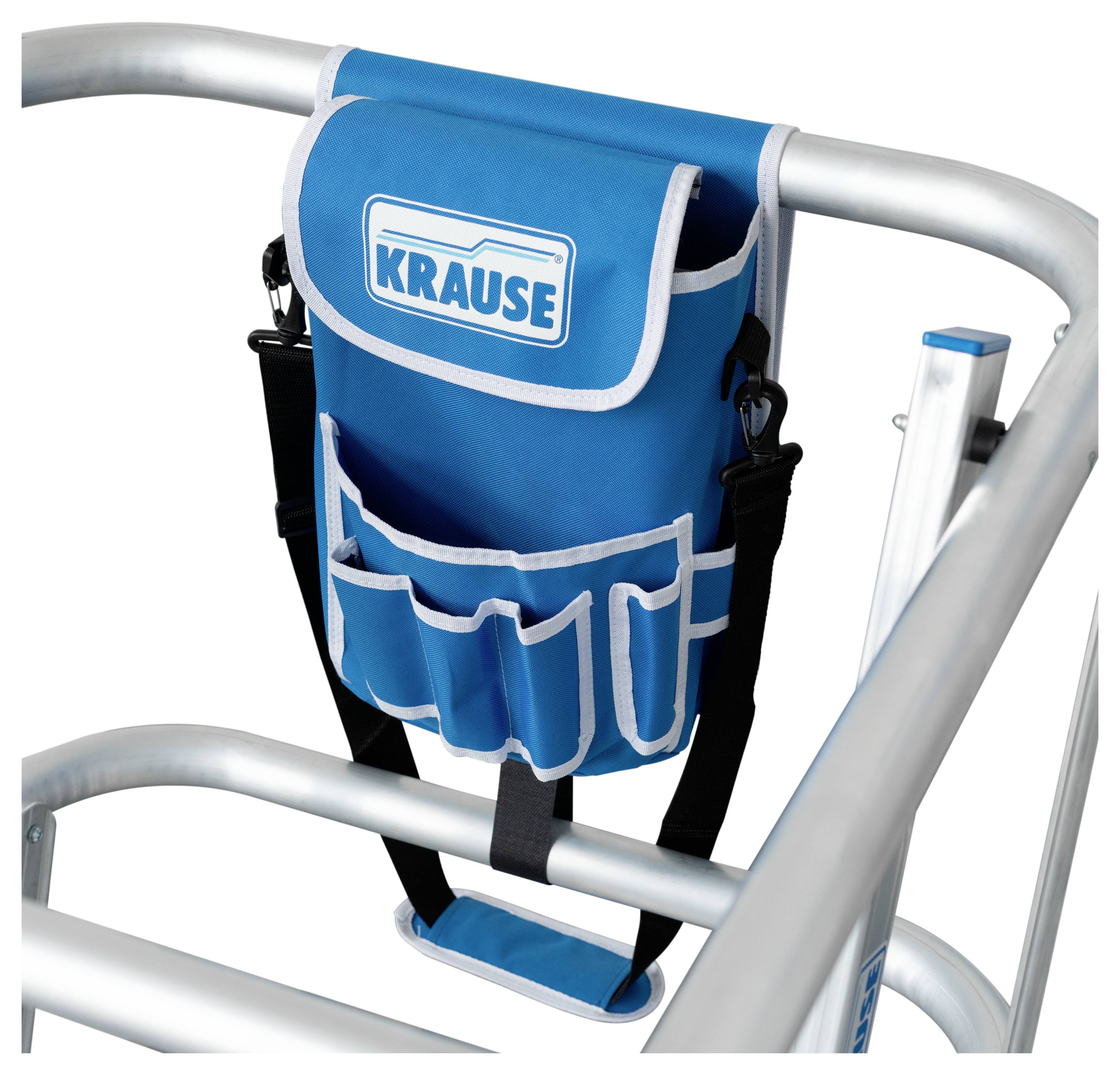 Blauer Werkzeughalter 'KRAUSE' an silberner Leiter befestigt, geeignet zur Aufbewahrung von Werkzeugen bei Arbeiten in der Höhe.