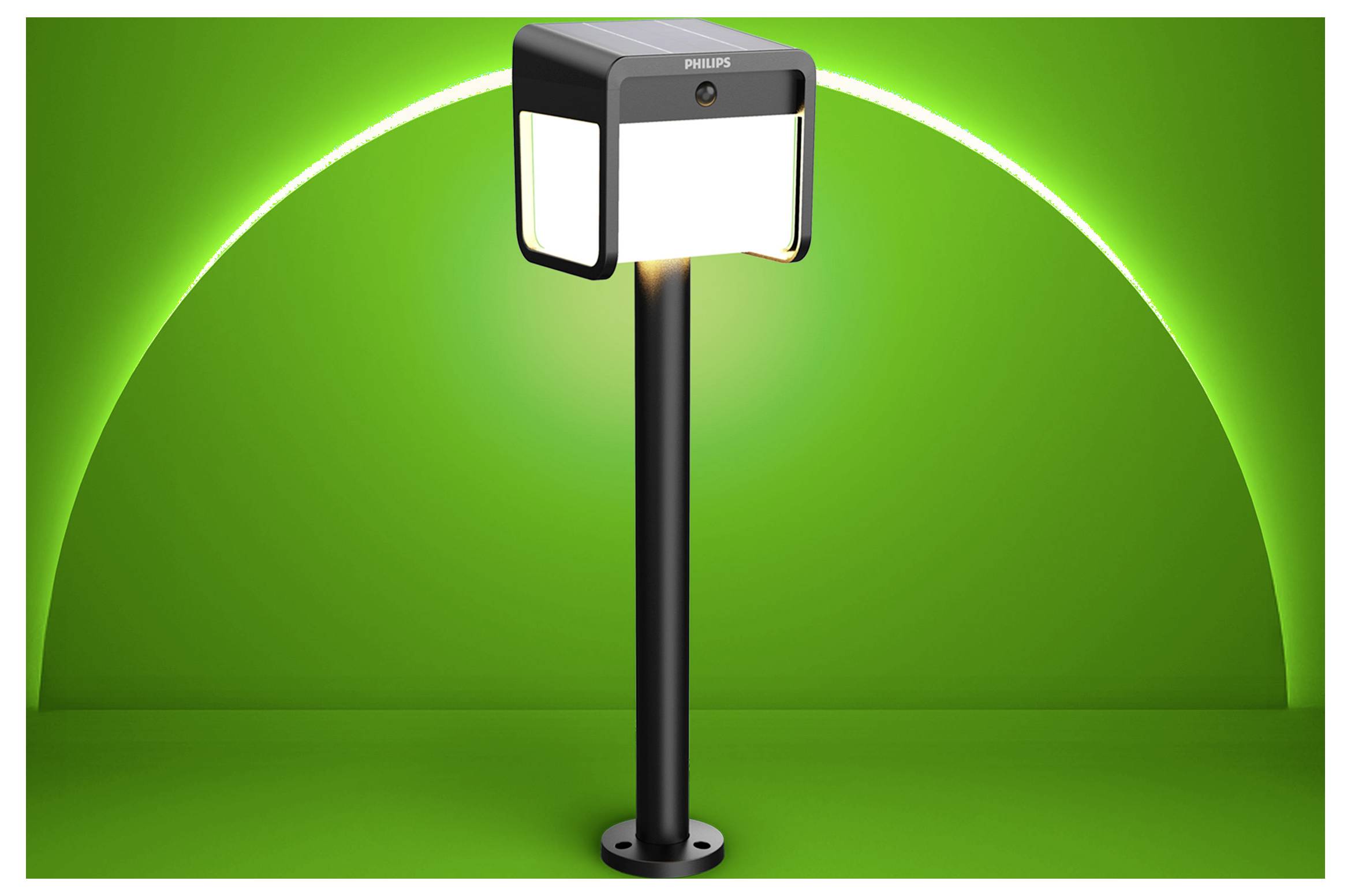 Eine schwarze Philips Außenleuchte mit quadratischen beleuchteten Paneelen auf einem hohen Pfosten vor grünem Hintergrund.