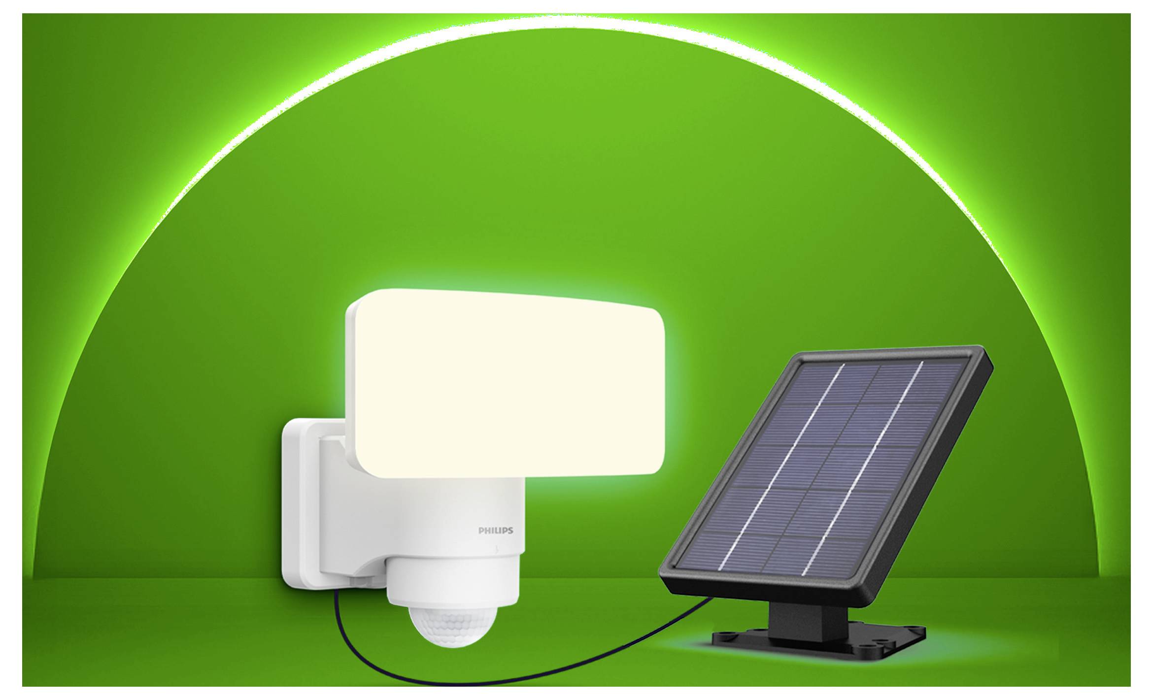 Solar-betriebene Bewegungsmelder-Sicherheitsleuchte mit angebrachtem Panel auf grünem Hintergrund.