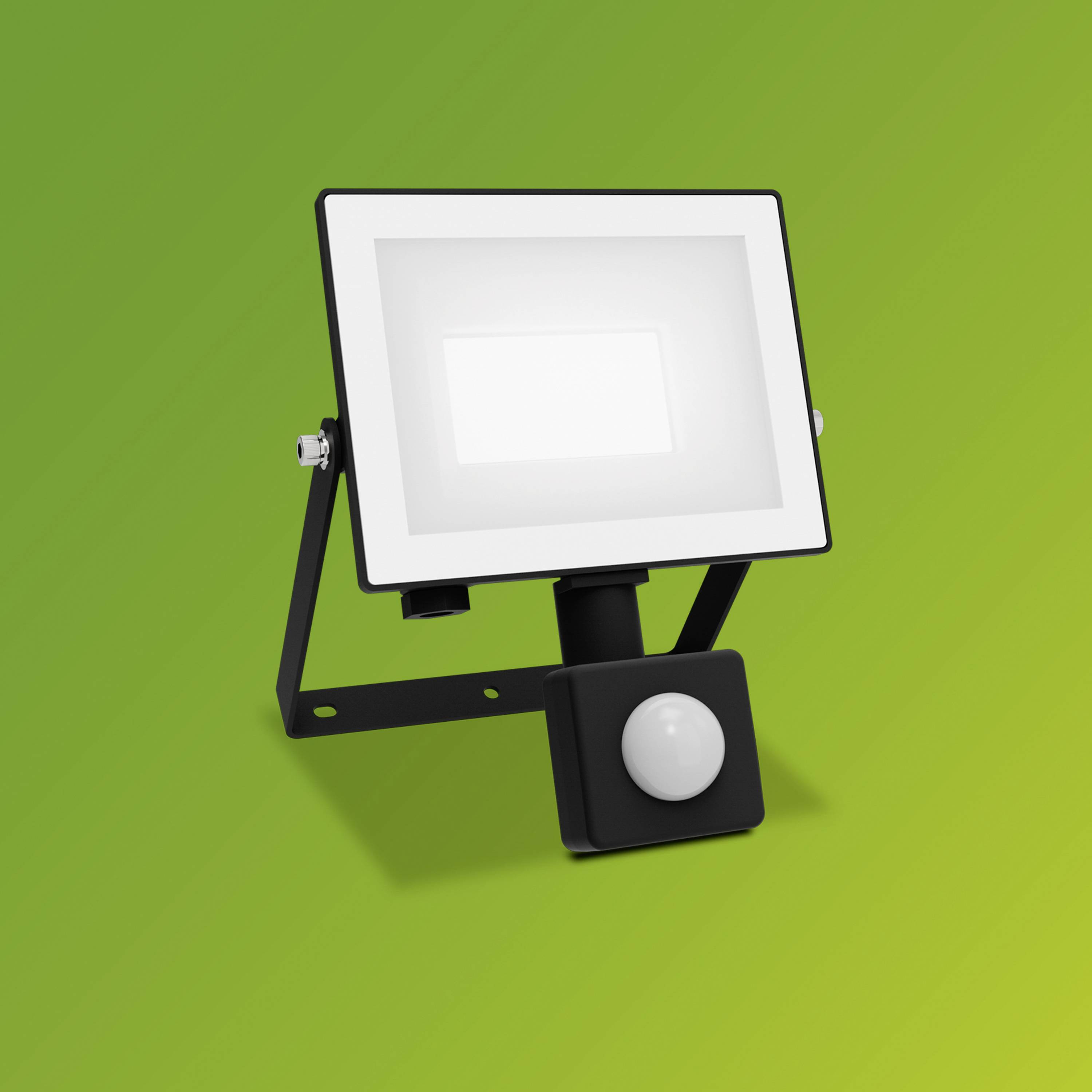 Ein quadratischer LED-Strahler mit integriertem Bewegungsmelder auf grünem Hintergrund. Geeignet für Außenbeleuchtung.