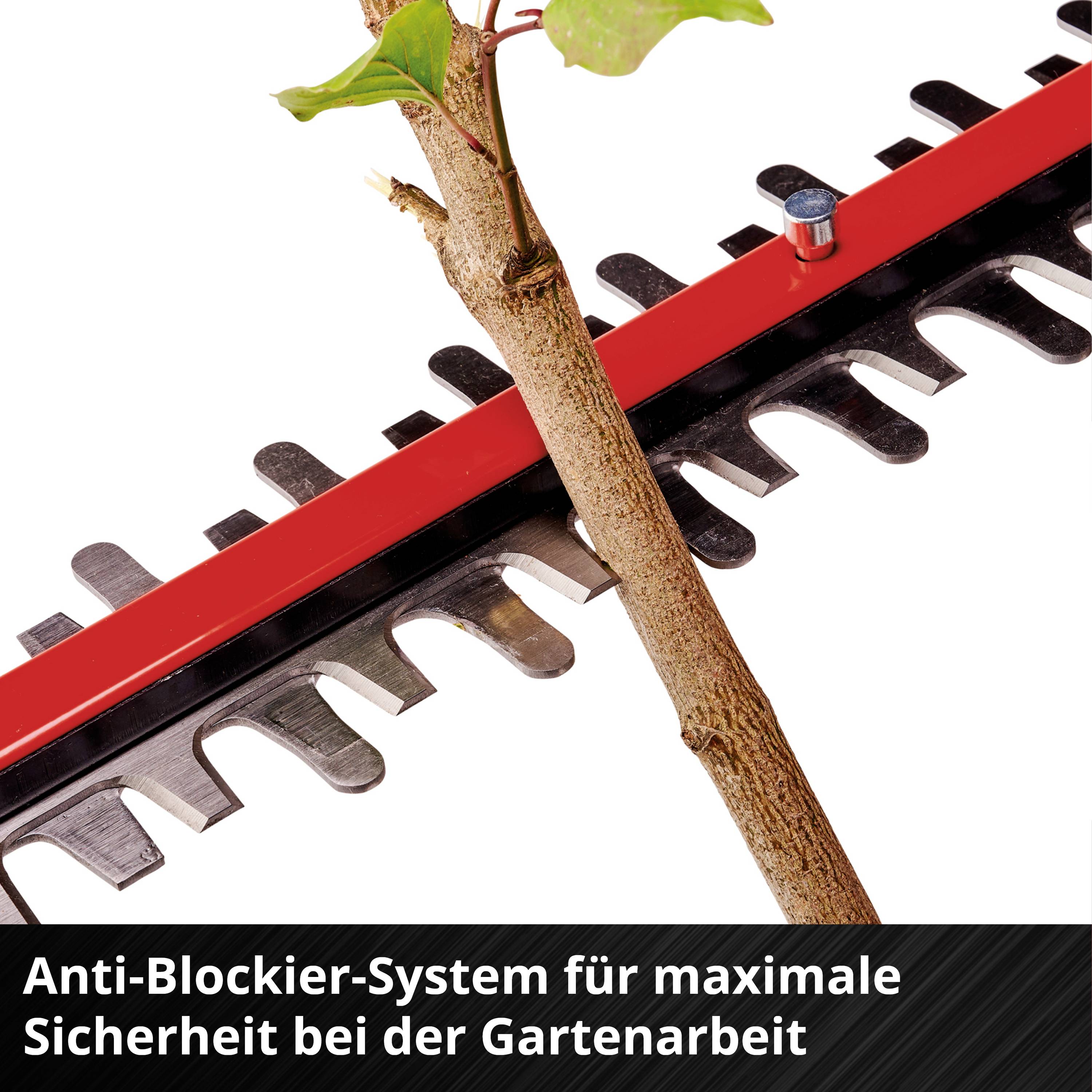 Nahaufnahme einer Heckenschere mit einem Ästchen zwischen den Klingen. Darunter Text: 'Anti-Blockier-System für maximale Sicherheit bei der Gartenarbeit'.