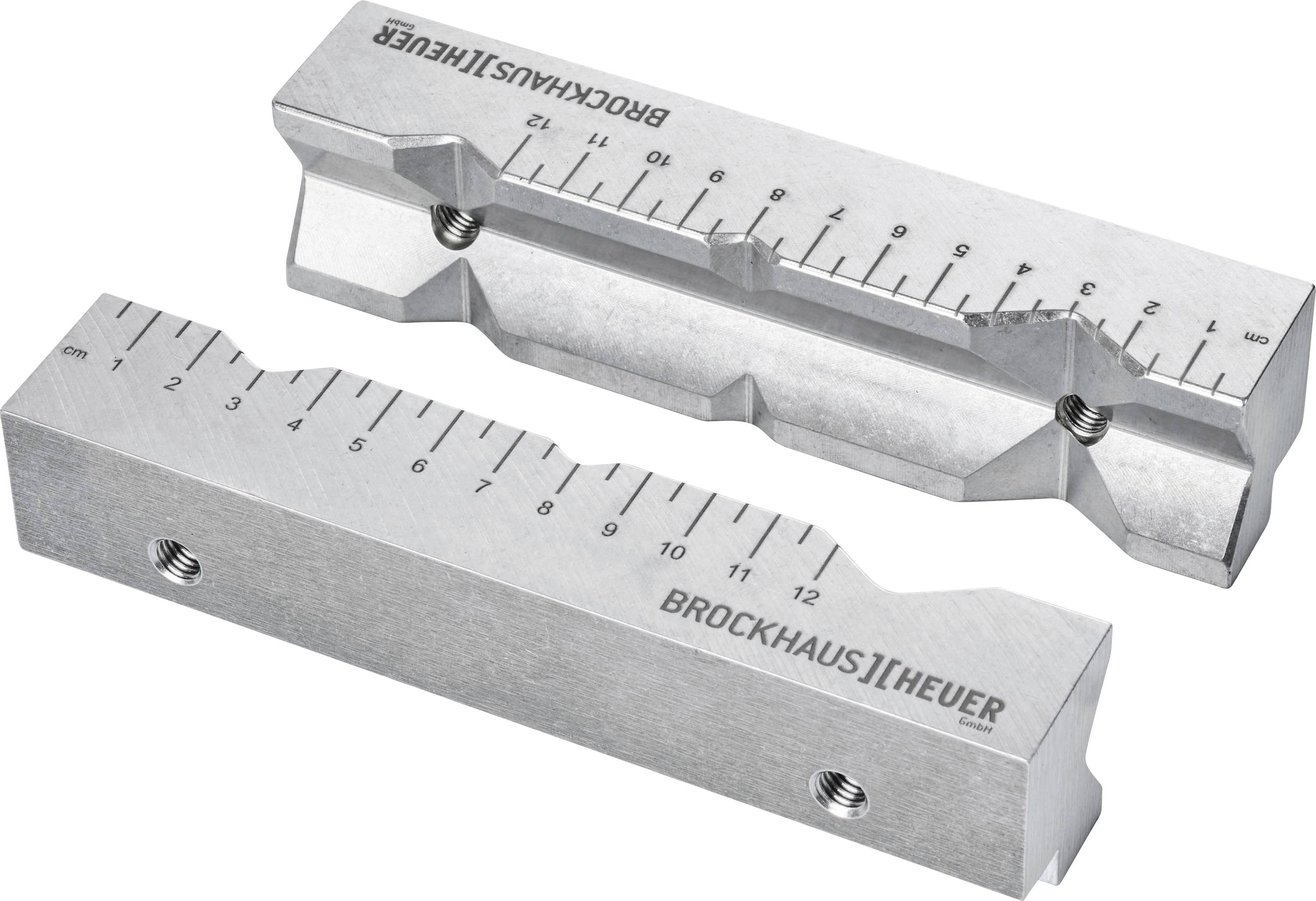 Zwei metallene Schraubstocksbacken mit Skala und Markierung der Marke Brockhaus Heuer.
