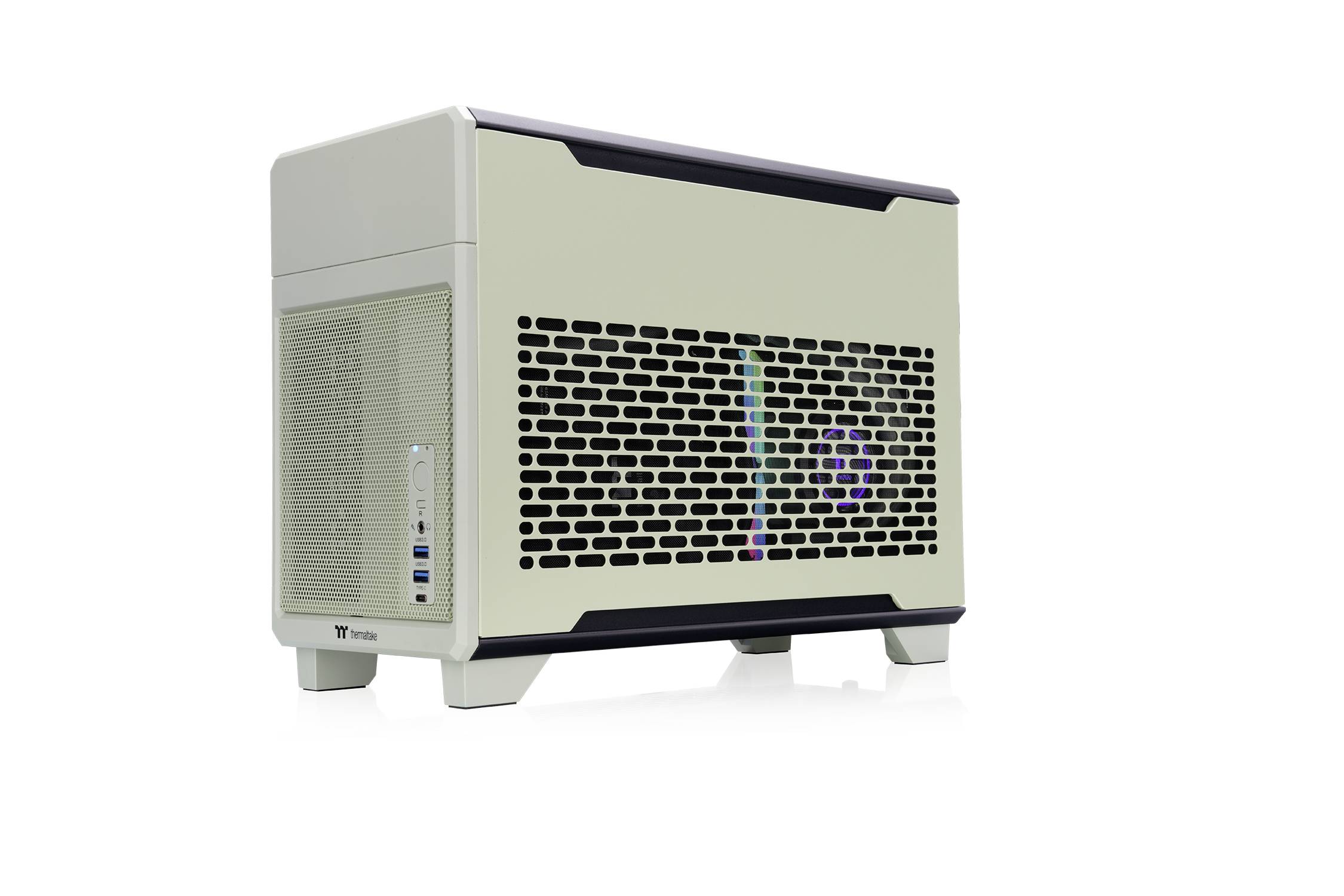 Ein kompaktes, cremefarbenes Computergehäuse mit Lüftungsschlitzen an der Seite. Enthält Anschlüsse an der Vorderseite.