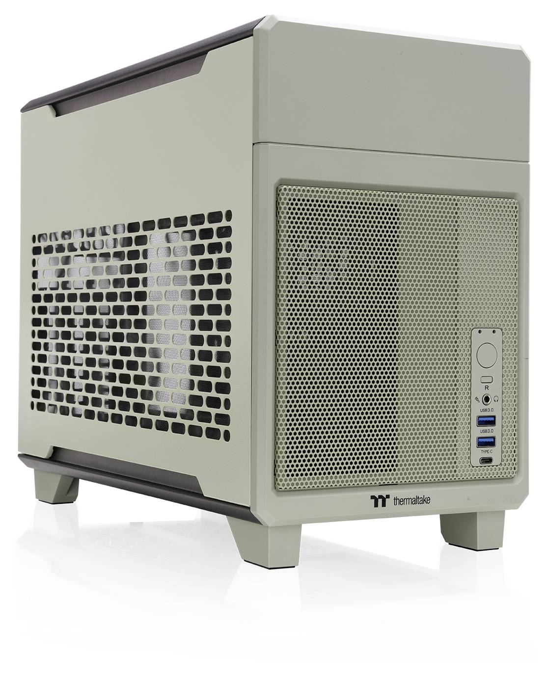 Ein beiger Computergehäuse mit Lüftungsgitter, Ein-/Aus-Taste, USB-Anschlüssen und Audiobuchse an der Vorderseite.