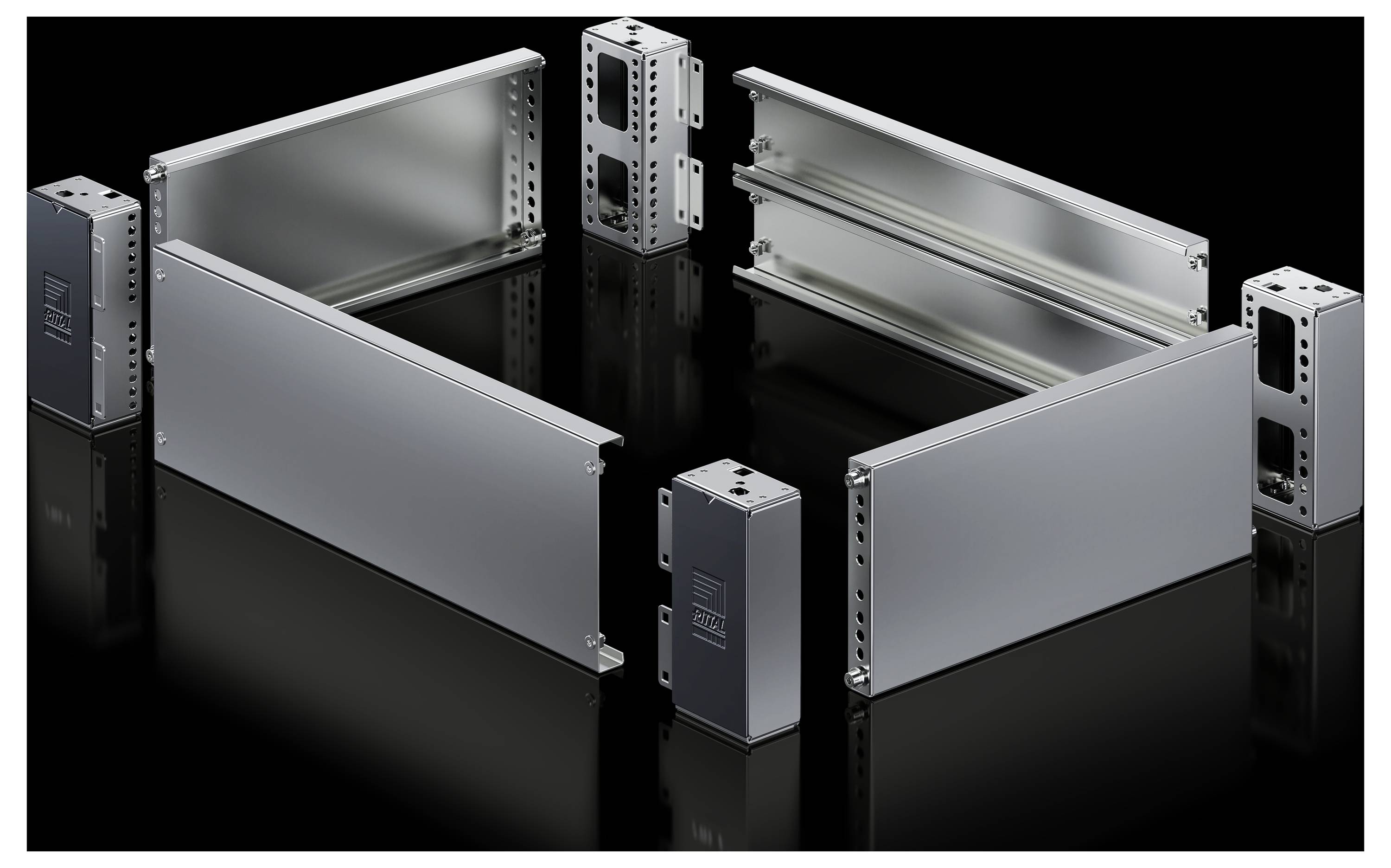 Metallgehäuse-Elemente in rechteckiger Anordnung auf schwarzem Hintergrund. Sie sind teilweise zusammengebaut und spiegeln leicht.