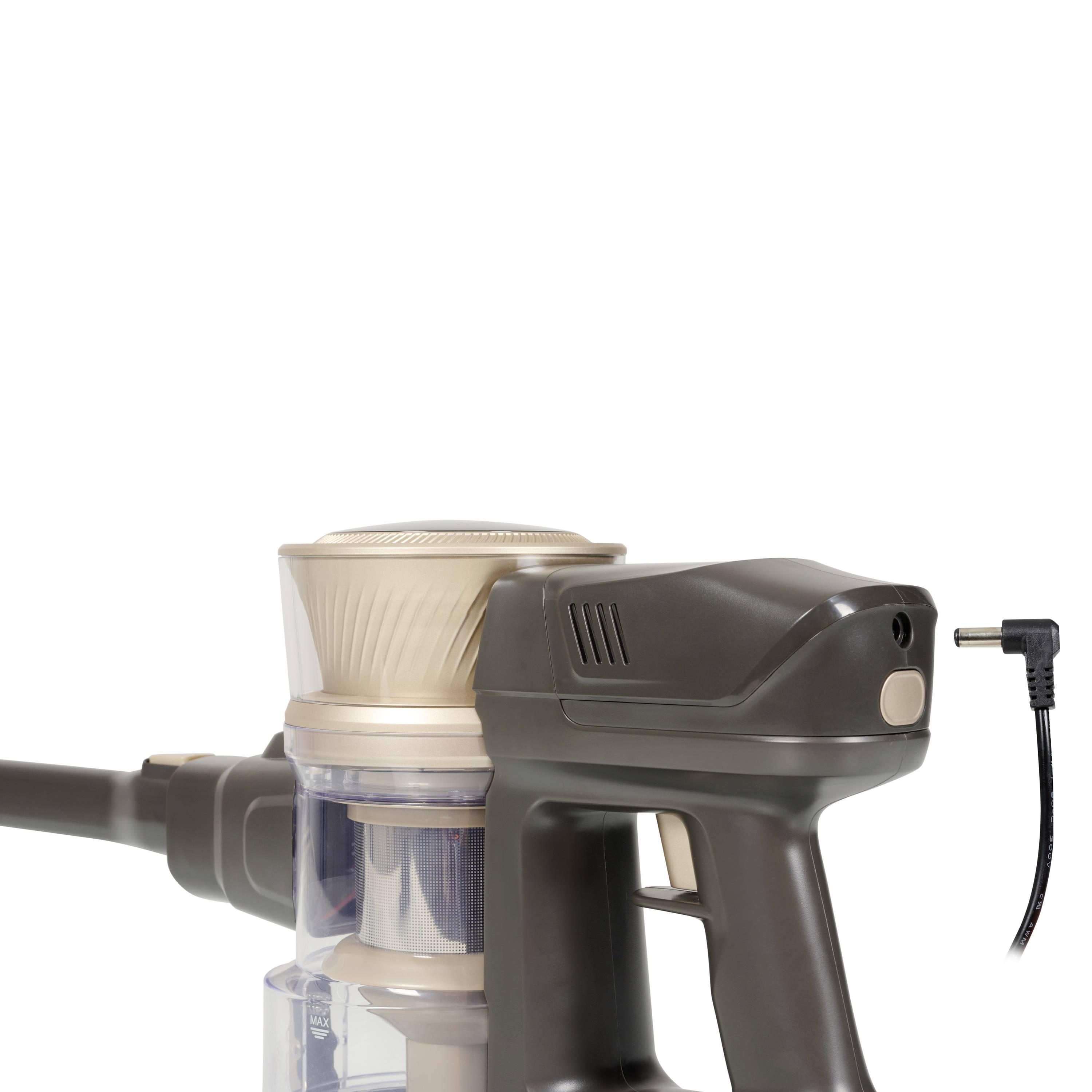 Ein kabelloser, handgehaltener Staubsauger mit grauem Gehäuse und durchsichtigem Schmutzbehälter, bereit zur Verwendung.