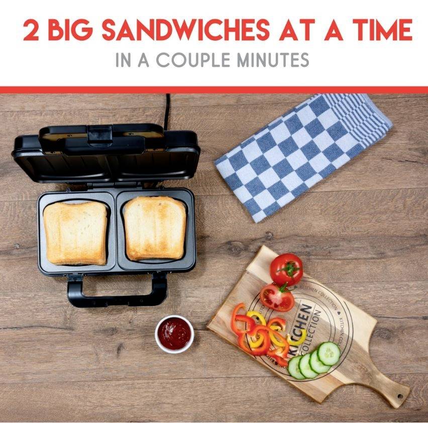 Sandwichmaker mit zwei Sandwiches, daneben Gemüse auf einem Holzbrett, Text oben: '2 Big Sandwiches at a time in a couple minutes'.