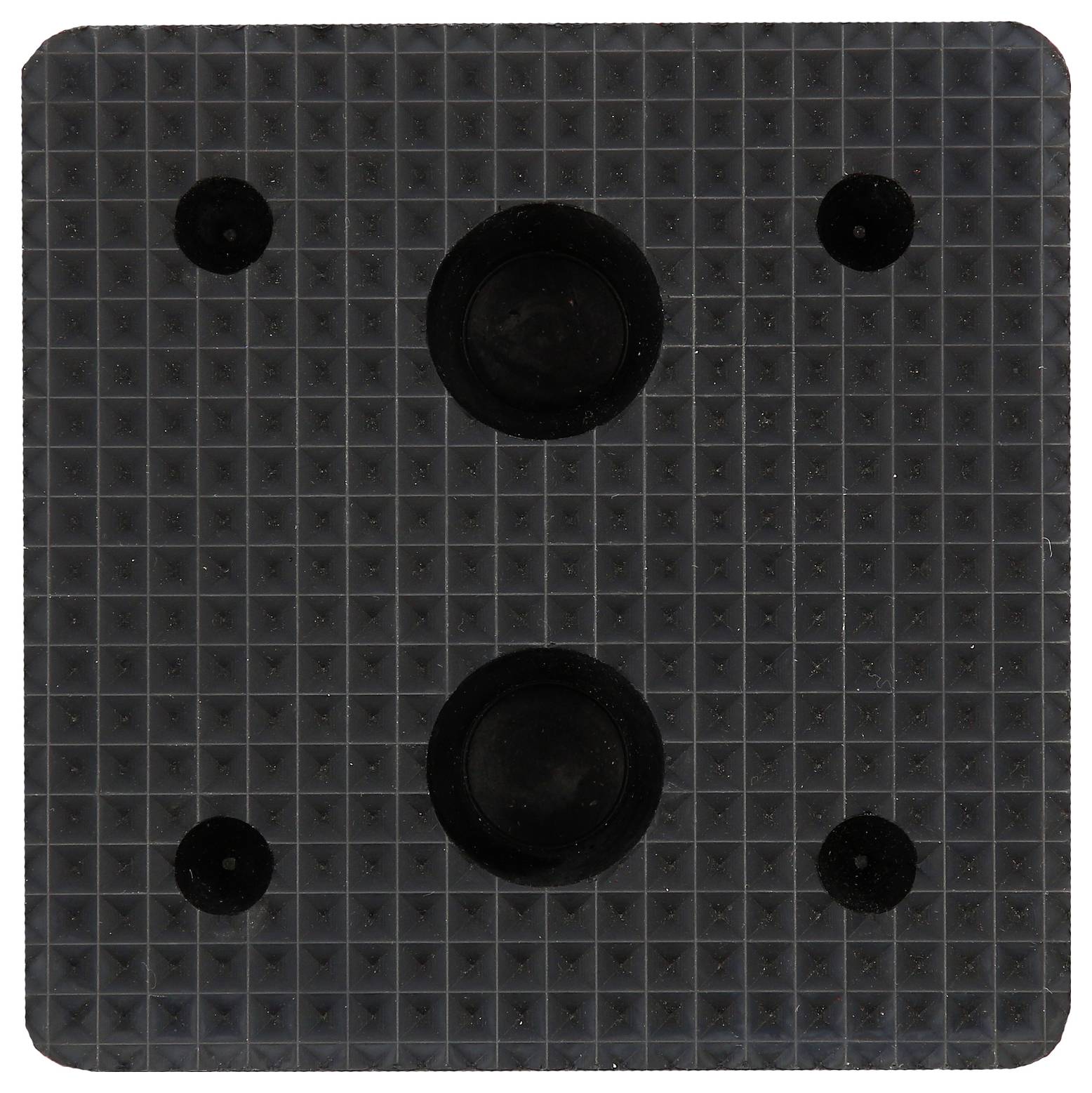 Eine schwarze Kachel mit einem Muster aus kleinen Quadraten und fünf größeren, symmetrisch angeordneten schwarzen Kreisen.