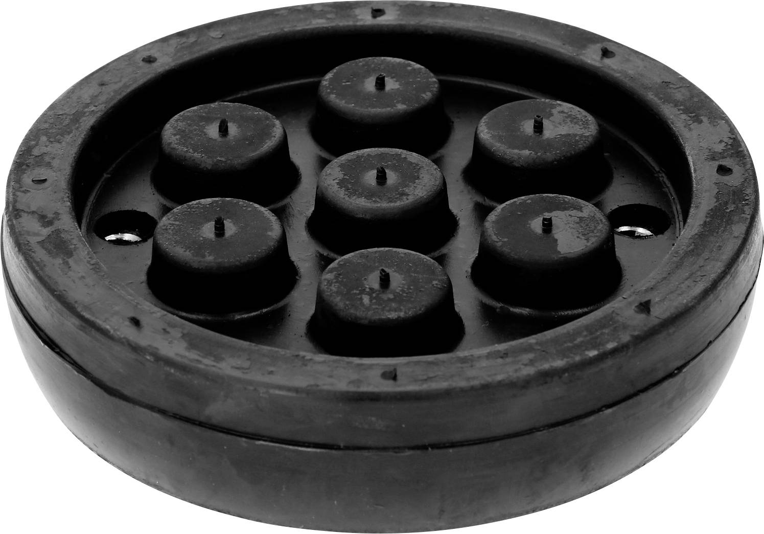 Schwarze runde Anti-Vibrationsmatte mit sieben Erhebungen, geeignet zur Reduzierung von Vibrationen und Geräuschen unter Geräten.