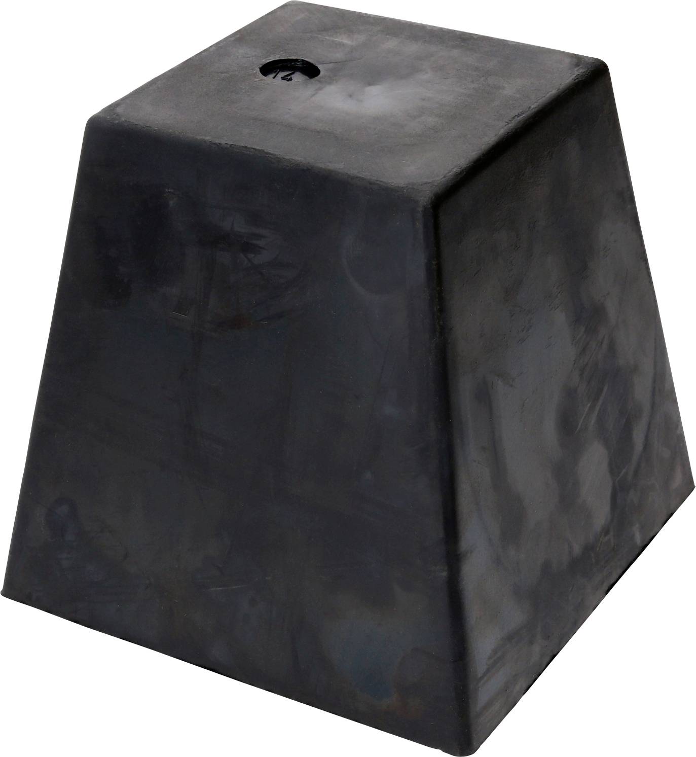 Ein schwarzer, kegelstumpfförmiger Gummifundamentblock, der zur Stabilisierung von temporären Strukturen verwendet wird.