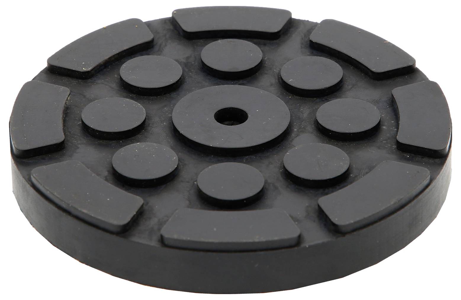 Schwarzes, rundes Gummipad mit kreisförmig angeordneten, rechteckigen und runden Erhebungen.