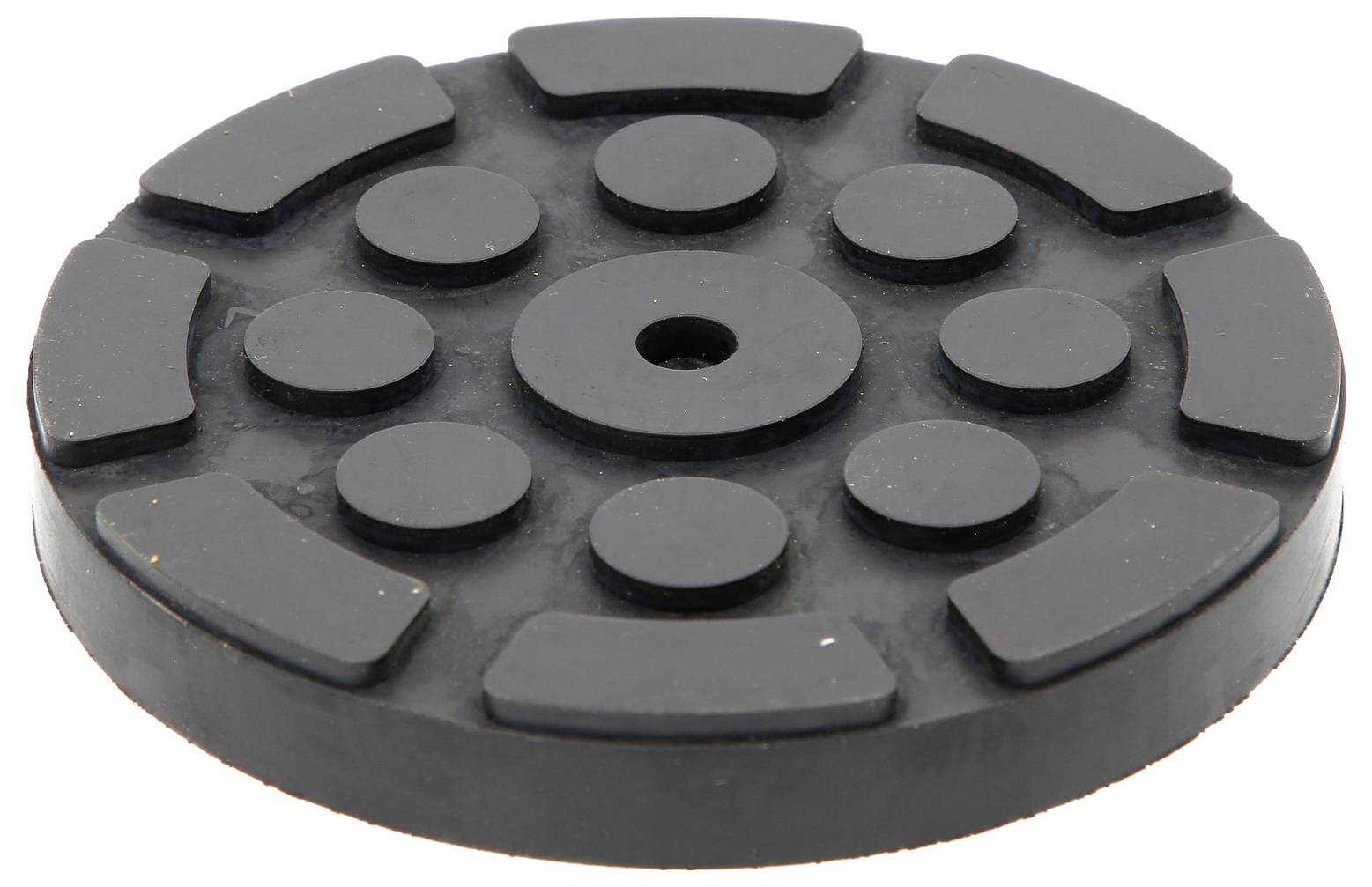 Schwarze, runde Gummiplatte mit neun erhöhten Flächen in zwei Kreisen. Verwendet als rutschfeste Unterlage oder Auflagefläche.