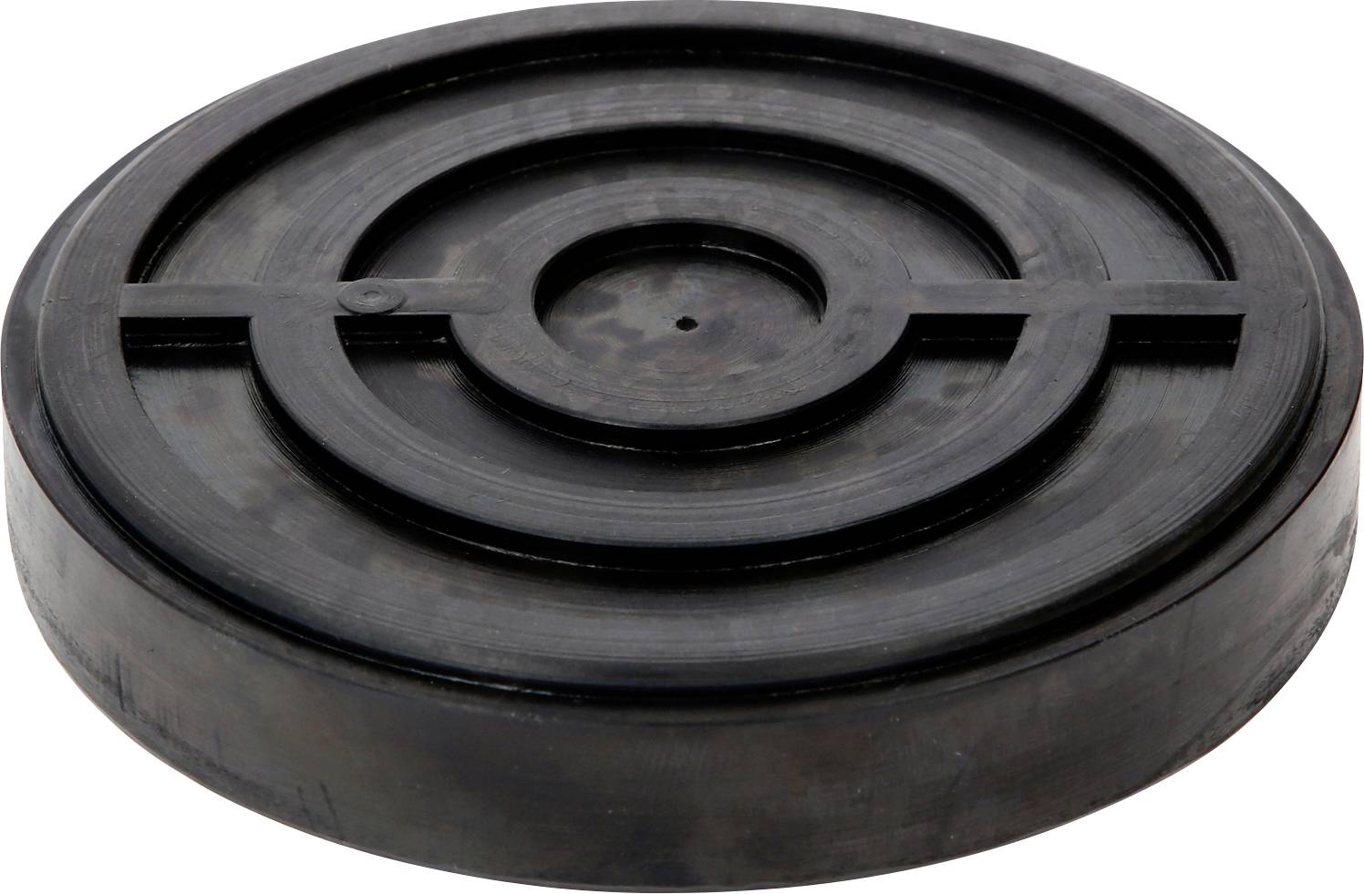 Ein runder schwarzer Kanaldeckel mit konzentrischen Kreisen. Strukturierte Oberfläche, robust und aus Metall gefertigt.