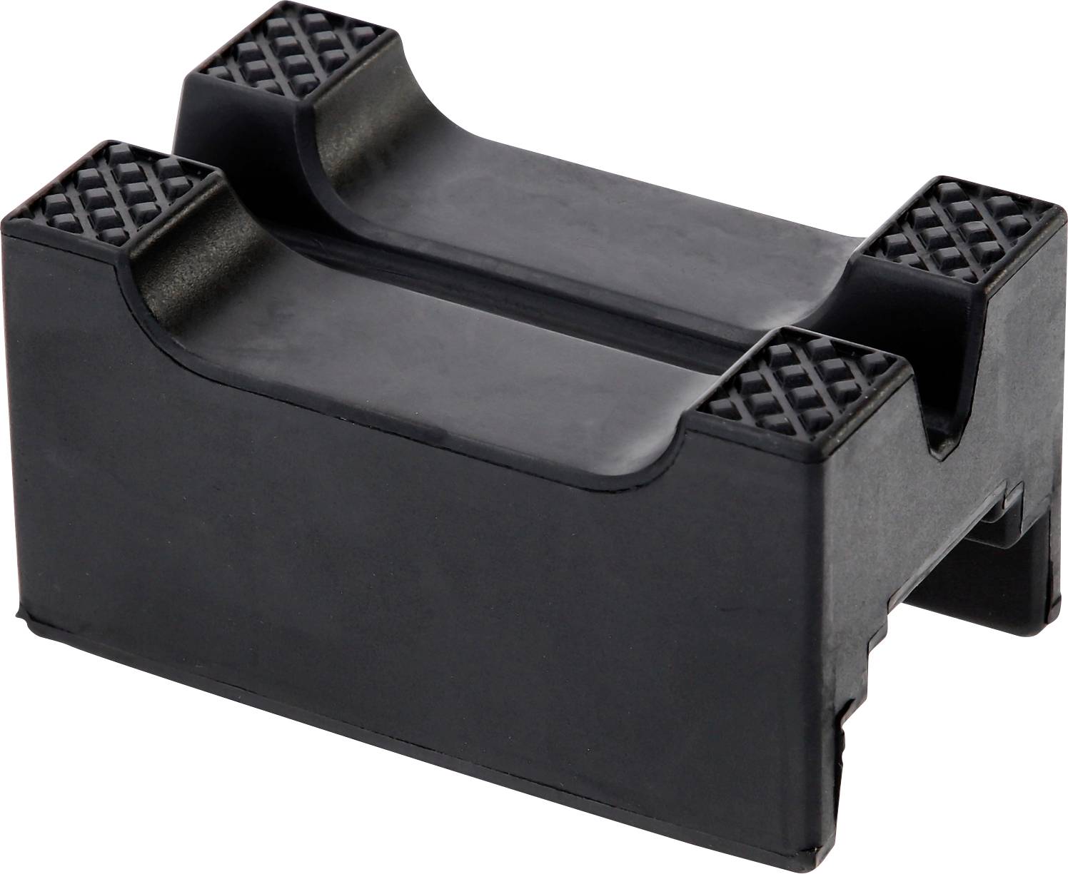 Ein rechteckiger, schwarzer Gummiblock mit Rillen in der Mitte, möglicherweise zum Halten oder Stützen von schweren Objekten gedacht.