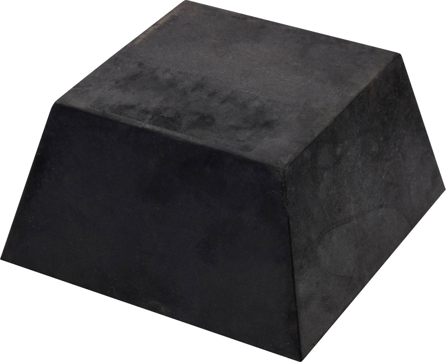 Schwarzer, quadratischer Block mit abgeschrägten Seiten, ähnlich einem Gummiblock; keine erkennbaren Muster oder Aufschriften.
