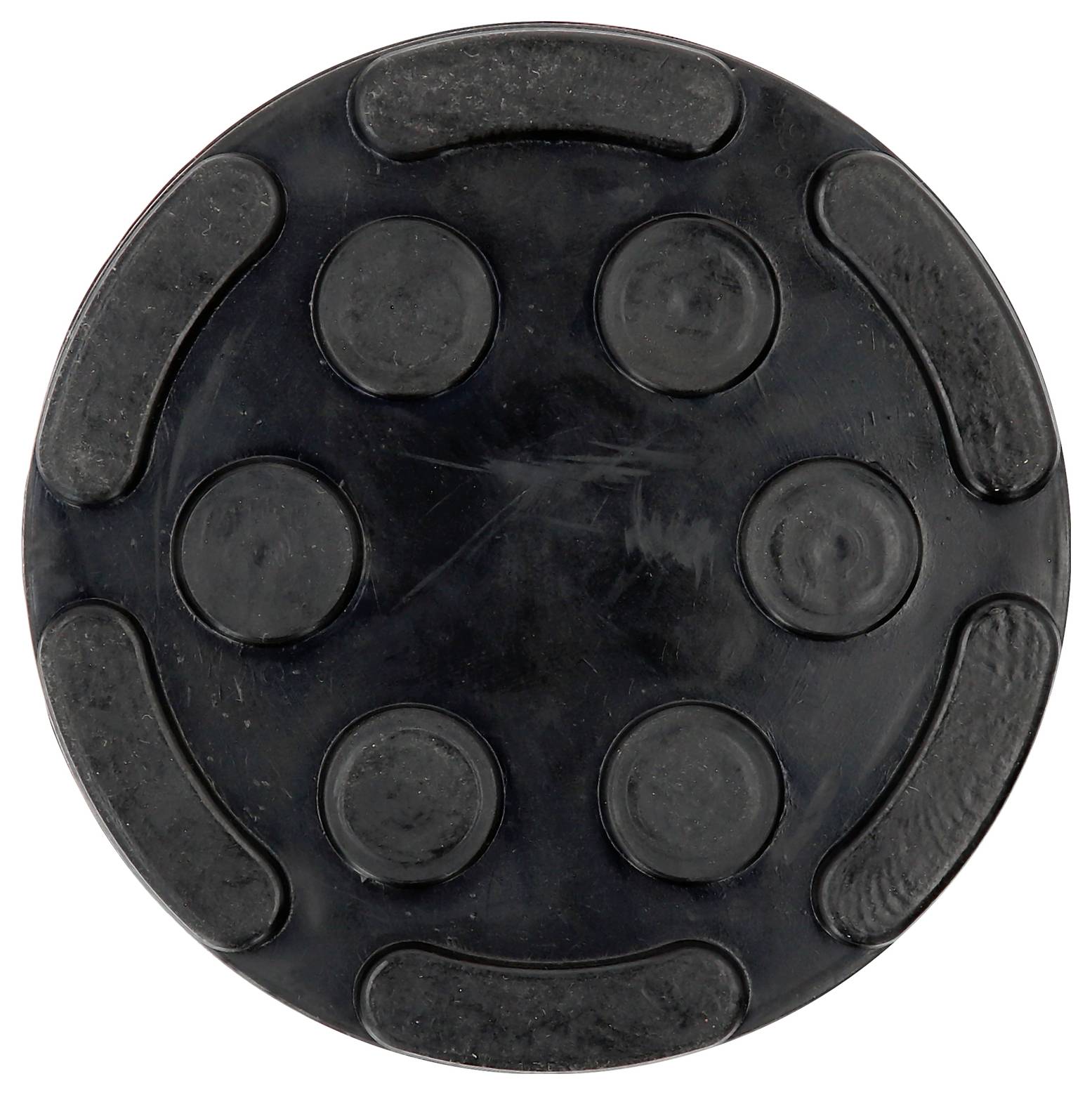 Schwarzes rundes Gummipad mit strukturierten, erhöhten Kreisen und gebogenen Linien auf der Oberfläche, wahrscheinlich zur Stabilität oder zum Schutz.