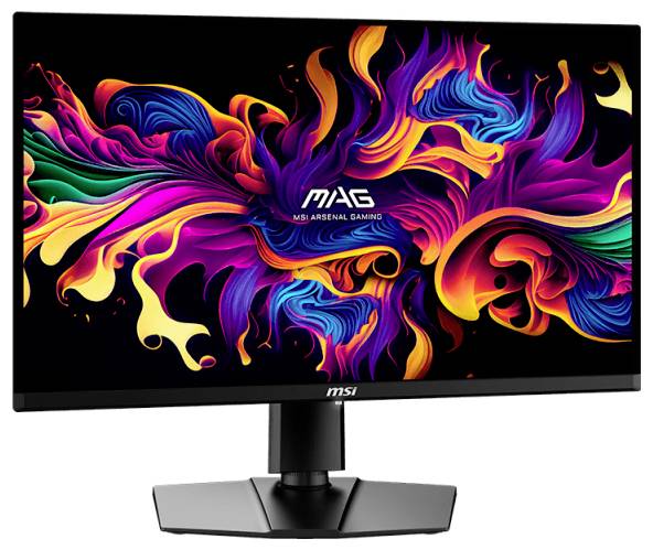 Ein Monitor zeigt ein farbenfrohes, abstraktes Muster mit leuchtenden Wellenformen und dem Text 'MAG' in der Mitte.