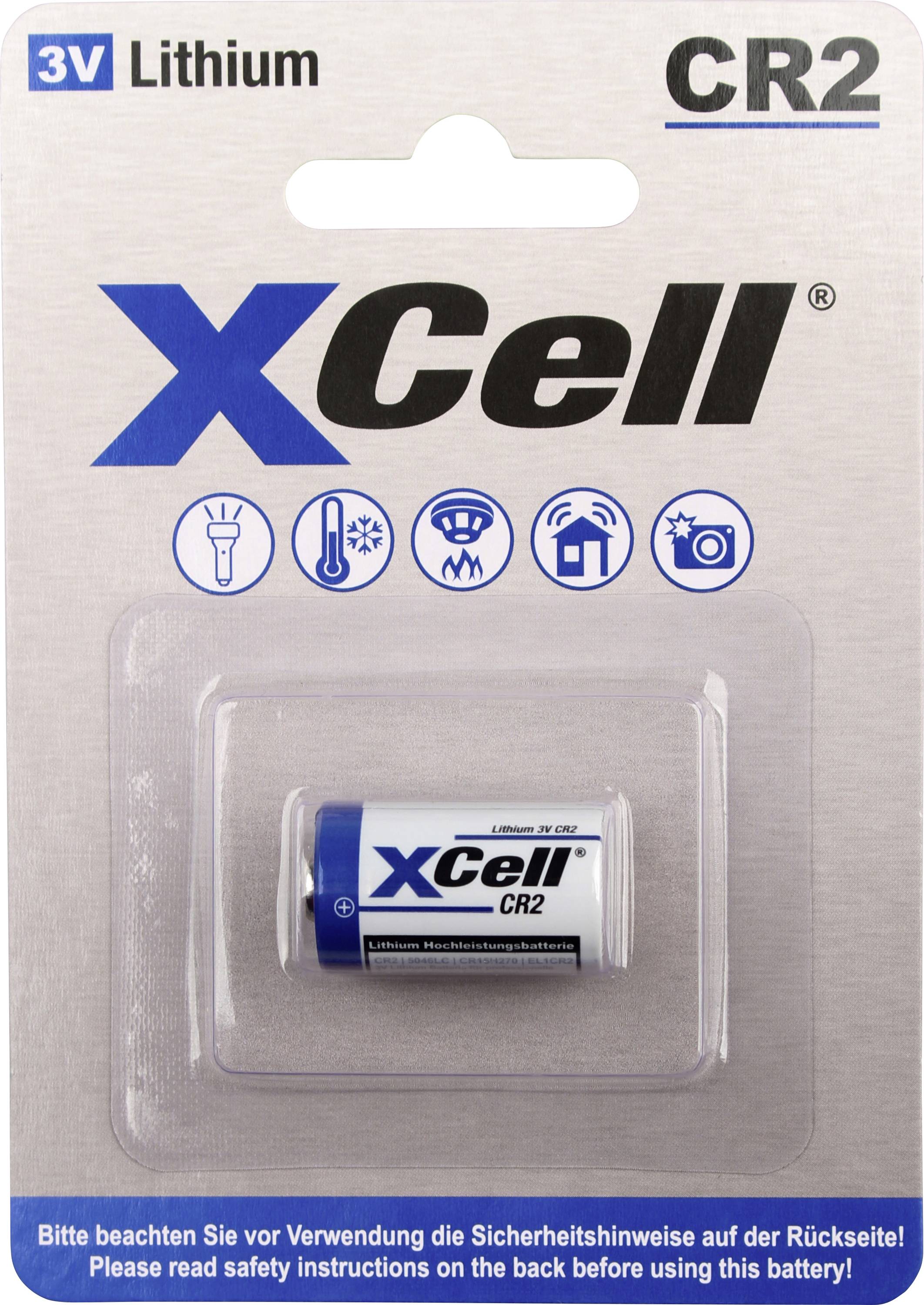 'XCell CR2 3V Lithium-Batterie' in Verpackung. Symbole zeigen, dass sie langlebig, schnell zu laden und mehrfachnutzbar ist.