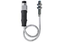 Ein Kabel mit schwarzem Griff und silbernem Anschluss, geeignet für industrielle Anwendungen.