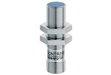 Metallischer zylindrischer Sensor, beschriftet mit 'CONTRINEX'. Verwendet für präzise Positions- und Distanzmessung in industriellen Anwendungen.