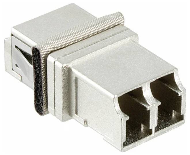 Ein Faseroptischer Koppler mit silberner metallischer Oberfläche, der zum Verbinden und Ausrichten von Faseroptikkabeln für effiziente Signalübertragung entwickelt wurde.