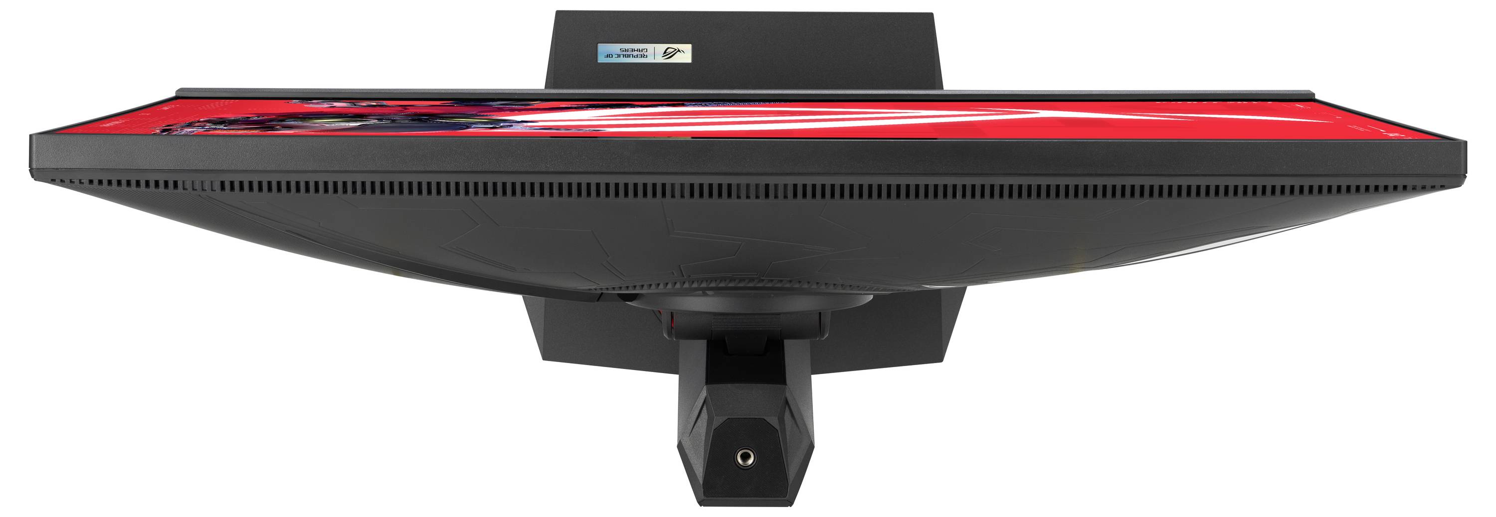 Ein Computerbildschirm von oben aufgenommen, zeigt ein leuchtend rotes Display mit schwarzen Elementen am Rand, auf schwarzem Hintergrund.